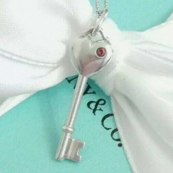Tiffany & Co. Jewelry - TIFFANY SMALL KEY CHARM /NECKLACE / PINK SAPPHIRE